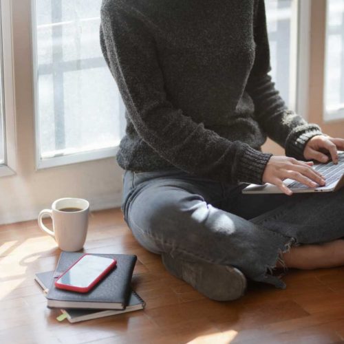 woman-in-gray-sweat-shirt-sitting-beside-window-3759080